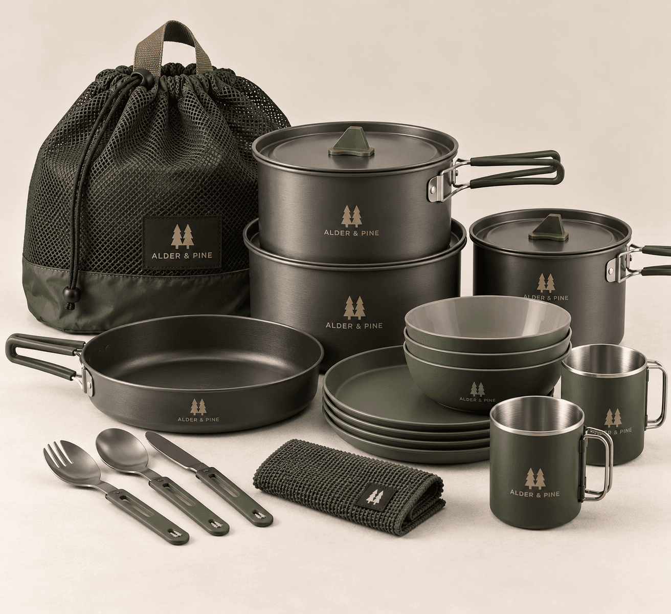 Trailhead Nesting Cookset: pots, lids, a frying pan, plates, mugs and utensils with a mesh stuff bag