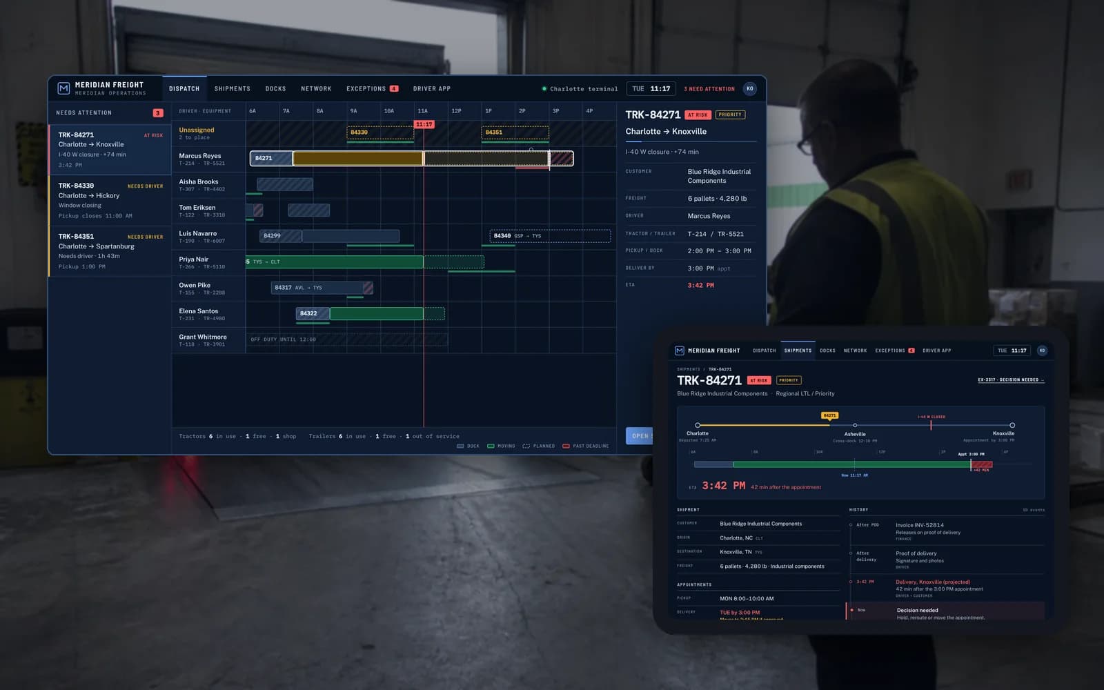 Meridian Operations dispatch board with an at-risk shipment beside its shipment record on a rugged tablet, in front of a warehouse loading dock.